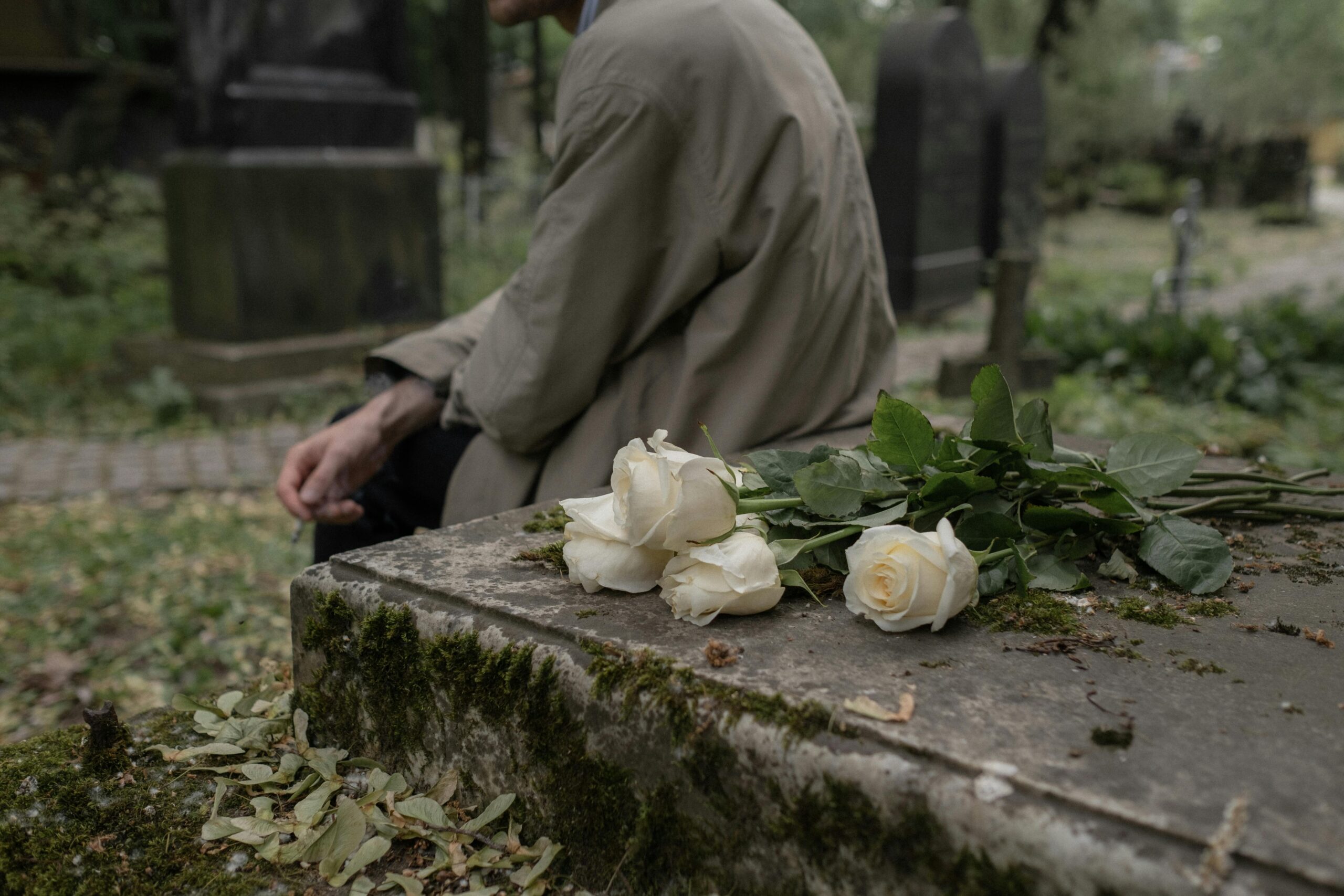 Close up of flowers on a grave